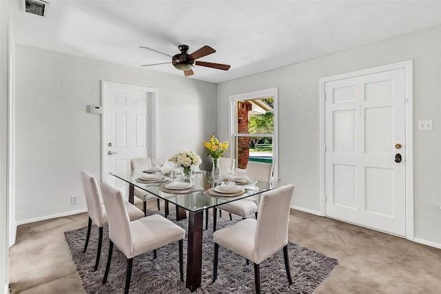 living room featuring ceiling fan and hardwood / wood-style flooring