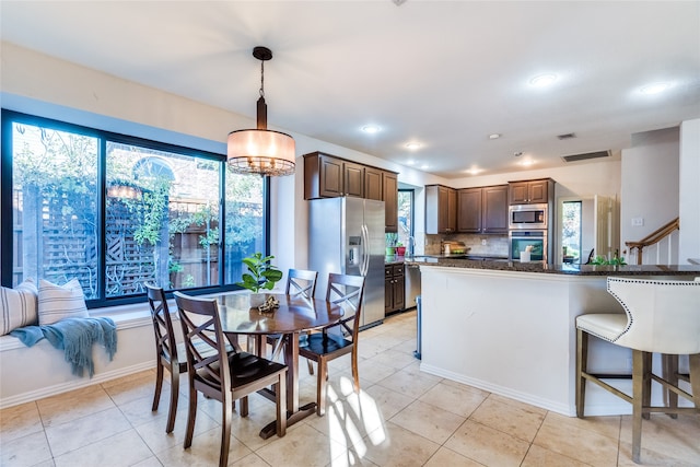 view of tiled dining area