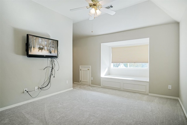 interior space with carpet and ceiling fan