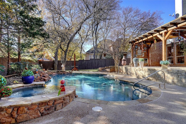 view of swimming pool with an in ground hot tub and a patio area