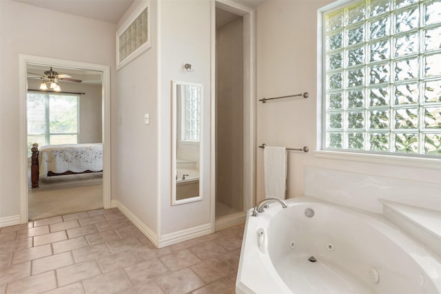 bathroom with a bath and ceiling fan