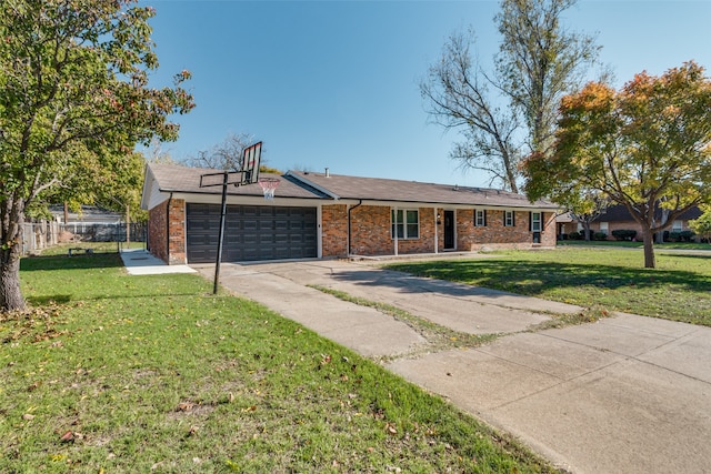 ranch-style house featuring a garage and a front lawn