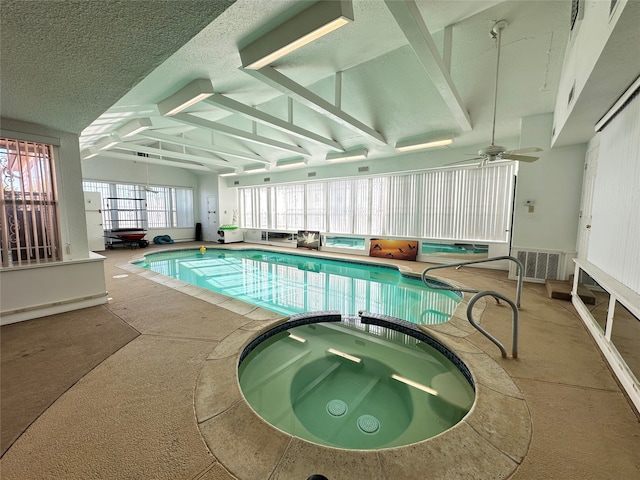 view of pool with an indoor in ground hot tub