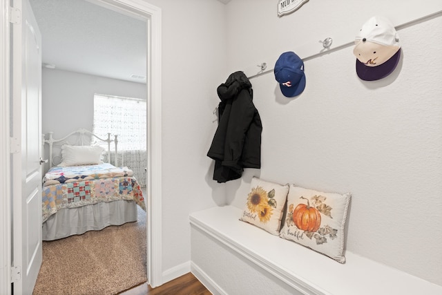 bedroom featuring dark wood-type flooring