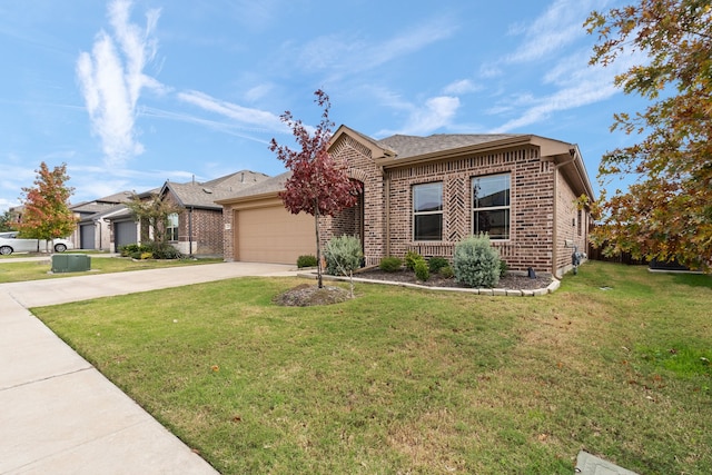 view of front of house featuring a garage and a front lawn