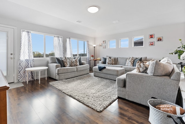 living room with dark hardwood / wood-style floors