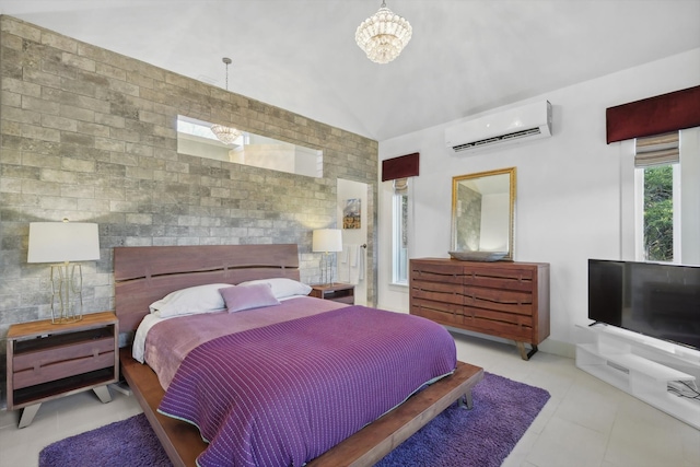 tiled bedroom featuring brick wall, a wall mounted air conditioner, a chandelier, and vaulted ceiling