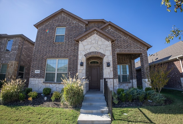 view of front of property with a front yard