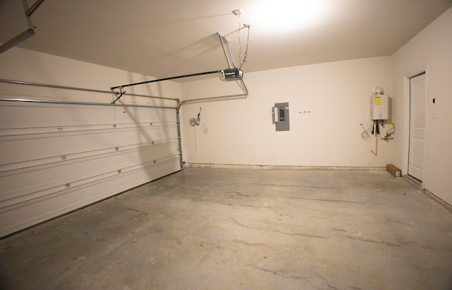 garage featuring a garage door opener, electric panel, and water heater