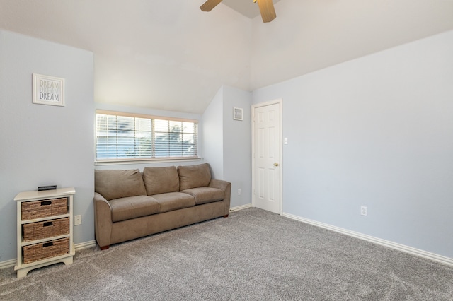 living room featuring carpet, ceiling fan, and lofted ceiling