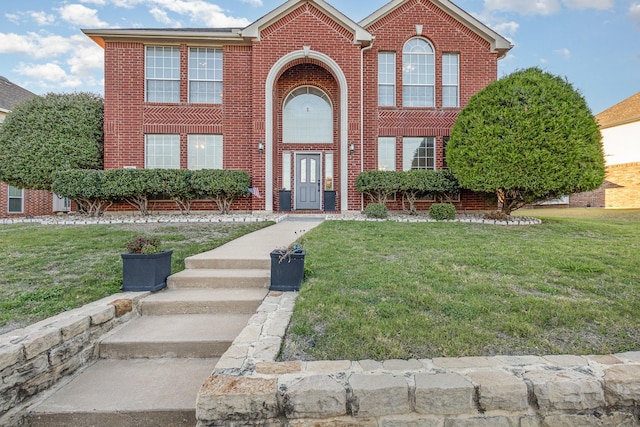 view of front of property featuring a front yard