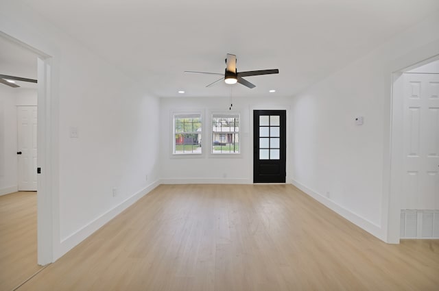 entrance foyer featuring ceiling fan and light hardwood / wood-style flooring