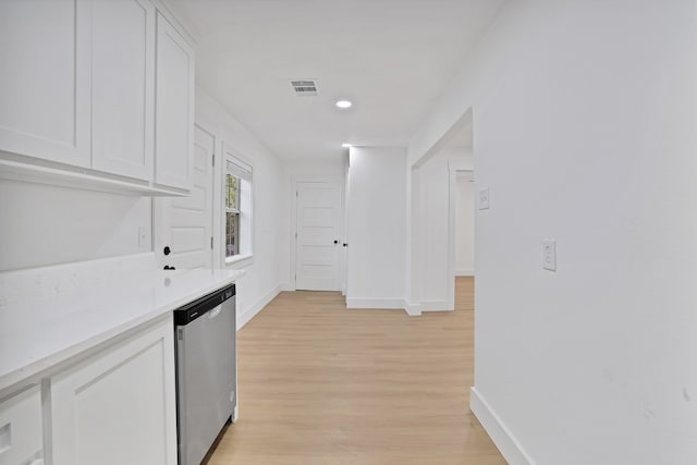 hall with light hardwood / wood-style flooring