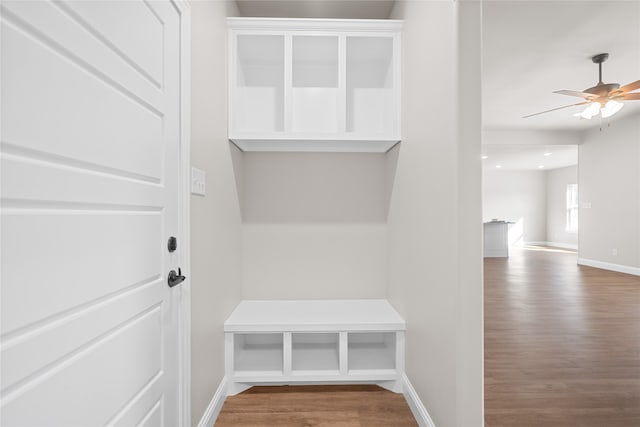 mudroom with hardwood / wood-style flooring and ceiling fan