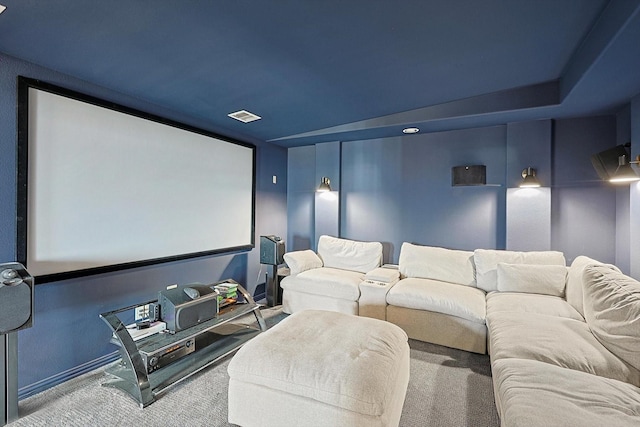 home theater with visible vents and carpet flooring