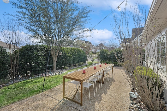 view of patio / terrace featuring fence