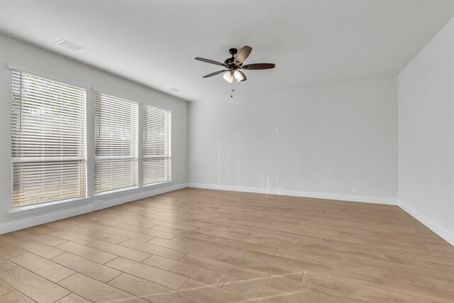 kitchen with stainless steel appliances, light hardwood / wood-style floors, and decorative backsplash