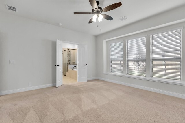 unfurnished living room with ceiling fan and light hardwood / wood-style floors