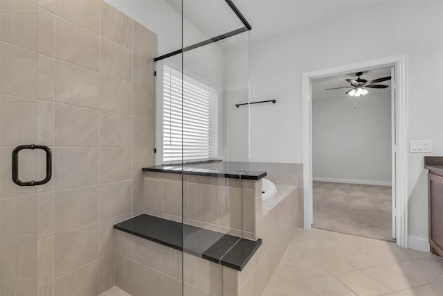 bathroom featuring tile patterned flooring, shower with separate bathtub, and ceiling fan