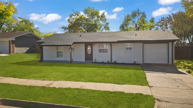 ranch-style house featuring a porch, a garage, and a front lawn