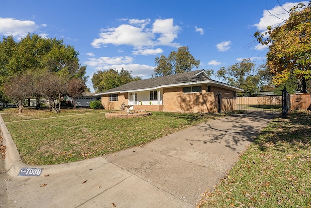 single story home with a front lawn