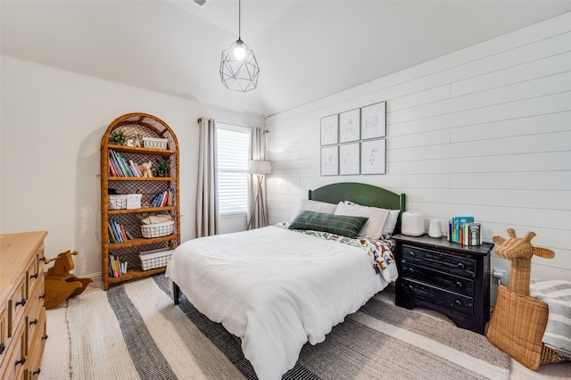 bedroom with lofted ceiling