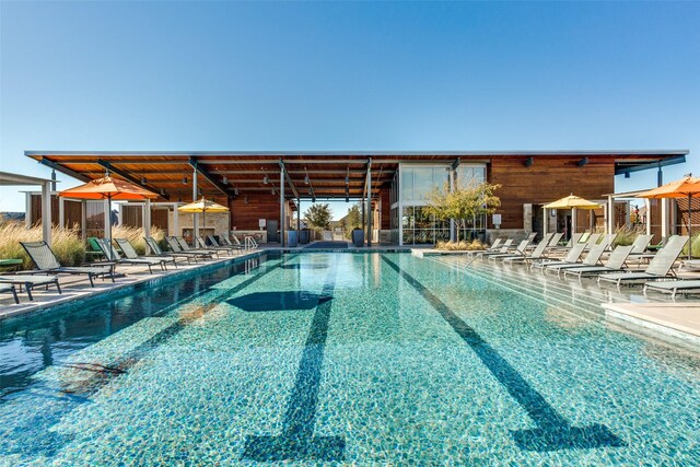 view of swimming pool featuring a patio