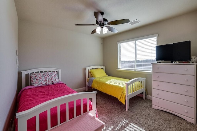 carpeted bedroom featuring ceiling fan