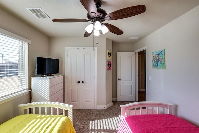 bedroom featuring carpet flooring, a closet, and ceiling fan