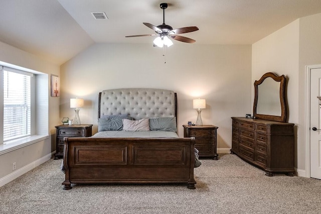 carpeted bedroom featuring ceiling fan and lofted ceiling