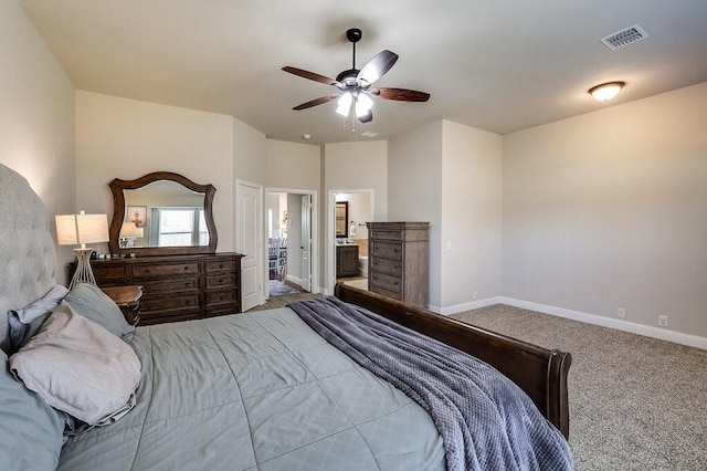 bedroom with carpet flooring, connected bathroom, and ceiling fan