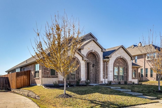 view of front of home with a front yard