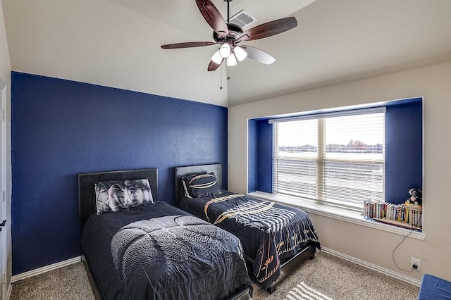 bedroom featuring ceiling fan, lofted ceiling, and carpet floors