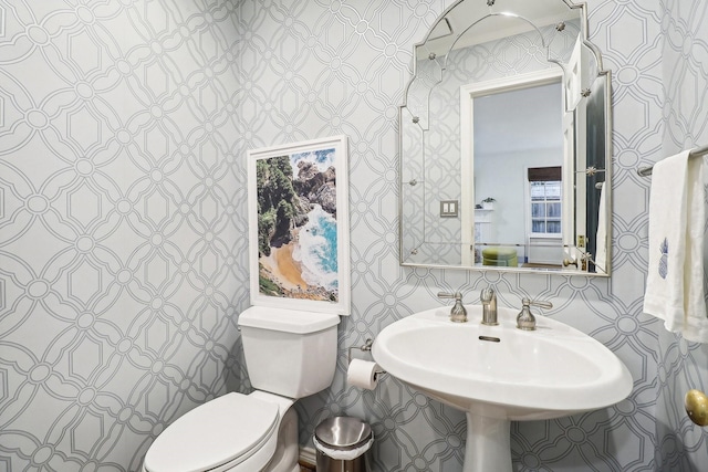 bathroom with sink and toilet