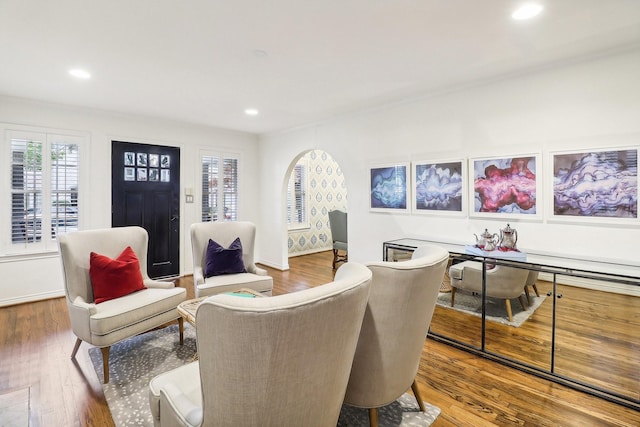 living room with hardwood / wood-style floors and a wealth of natural light