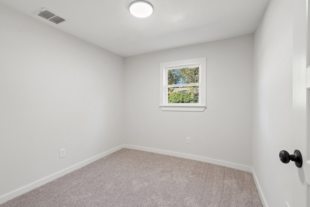 empty room featuring carpet