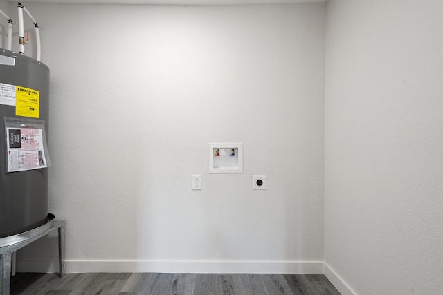 laundry room featuring hookup for an electric dryer, washer hookup, dark hardwood / wood-style flooring, and water heater