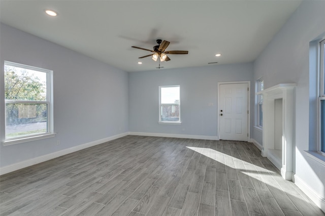 unfurnished room featuring ceiling fan