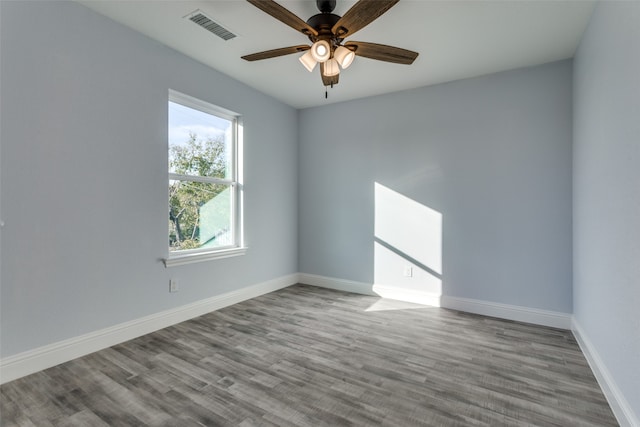 unfurnished room featuring ceiling fan and light hardwood / wood-style flooring