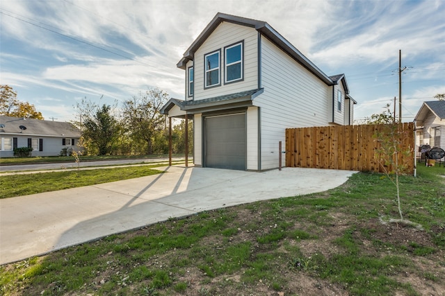 view of property exterior with a garage