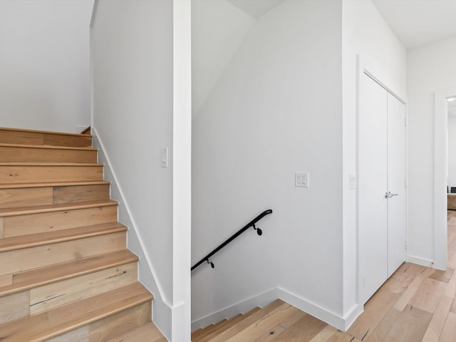 1536 Holly Ave Unit 107, Dallas, TX 75204 - stairway with wood finished floors and baseboards