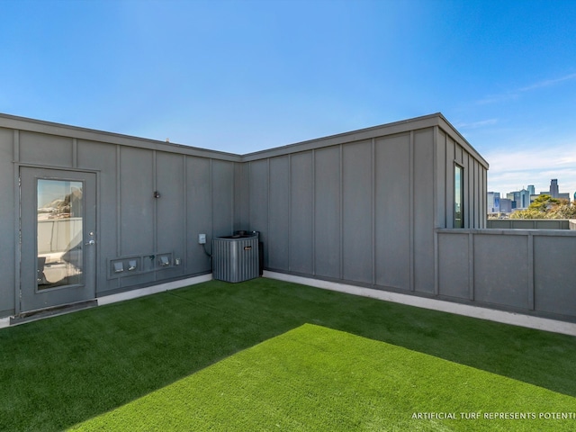 view of yard featuring central AC unit