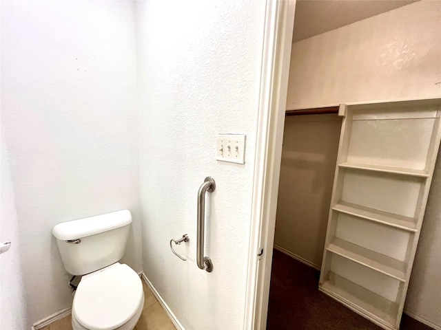 bathroom featuring toilet