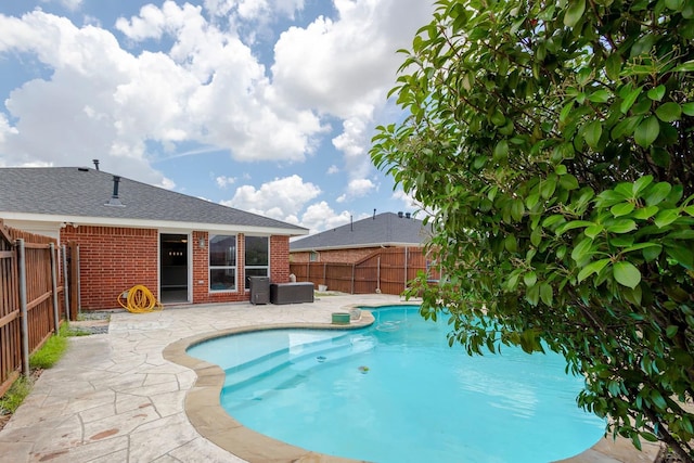 view of pool with a patio area