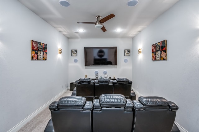 carpeted cinema with ceiling fan