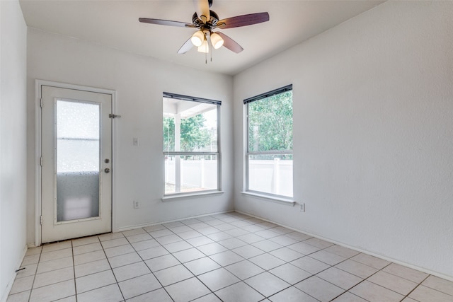 interior space featuring ceiling fan