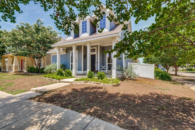 cape cod home with covered porch