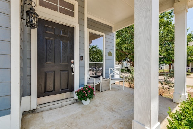 property entrance with a porch