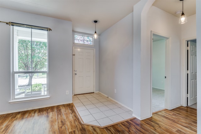 foyer with light hardwood / wood-style flooring