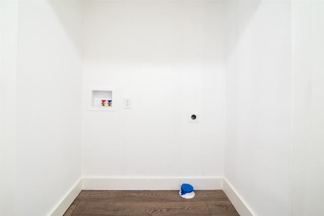 laundry room featuring electric dryer hookup, dark hardwood / wood-style flooring, and hookup for a washing machine